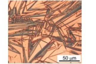 Hydrogen-assisted damage in austenite/martensite dual-phase steel