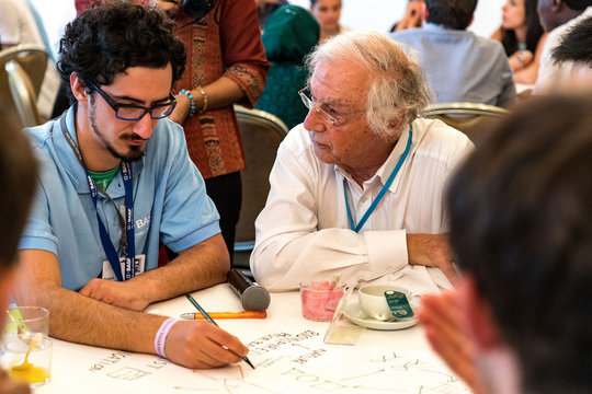 Enrico Pizzutilo together with the chemist and Nobel laureate Robert Huber.
