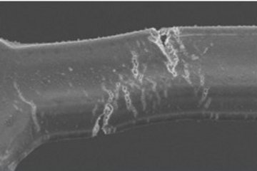 Combinatorial approach to tailor electrical and mechanical properties of alloyed thin film structures