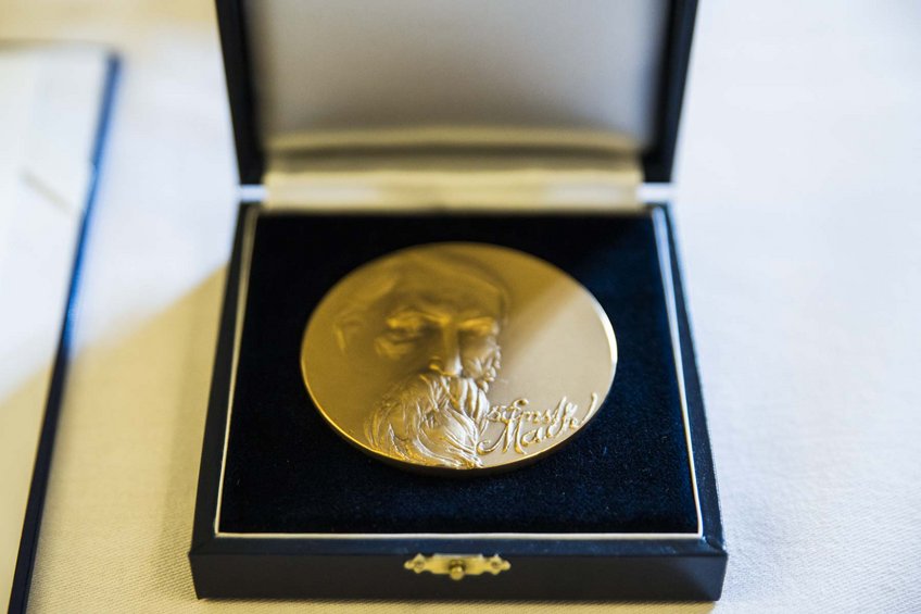 Ernst Mach Medal, named after one of the most eminent physicists of the late 19th century. Ernst Mach Medal, named after one of the most eminent physicists of the late 19th century.