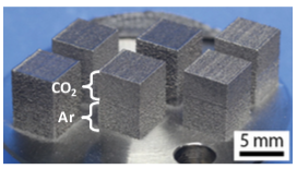 Cube specimens produced by L-PBF under different process gases. Cube specimens produced by L-PBF under different process gases.