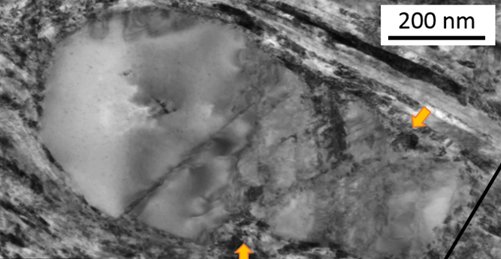 Figure: Plastic flow of martensite around cementite during high pressure torsion Figure: Plastic flow of martensite around cementite during high pressure torsion