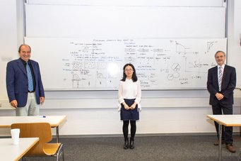 Dr. Yu Qin after her successful PhD defense with her two supervisors Prof. Joachim Mayer (on the left), director at the Ernst-Ruska-Centre for Microscopy and Spectroscopy and professor at the RWTH Aachen University, and Prof. Dierk Raabe, director at the MPIE and also professor at the RWTH Aachen University. Dr. Yu Qin after her successful PhD defense with her two supervisors Prof. Joachim Mayer (on the left), director at the Ernst-Ruska-Centre for Microscopy and Spectroscopy and professor at the RWTH Aachen University, and Prof. Dierk Raabe, director at the MPIE and also professor at the RWTH Aachen University.