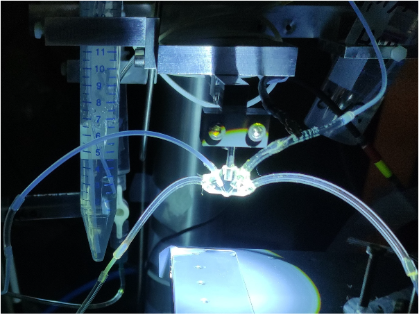 Figure 1. Photograph of an illuminated scanning flow cell (iSFC).