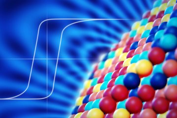 Colorful spheres arranged in a pattern against a blue abstract background.