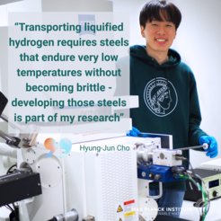 A researcher in casual attire stands beside advanced laboratory equipment. A quote by Hyung-Jun Cho discusses steel development for hydrogen transport, highlighting the need for materials that endure low temperatures without becoming brittle.